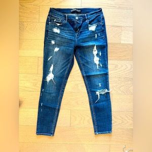 Express blue jeans with rips